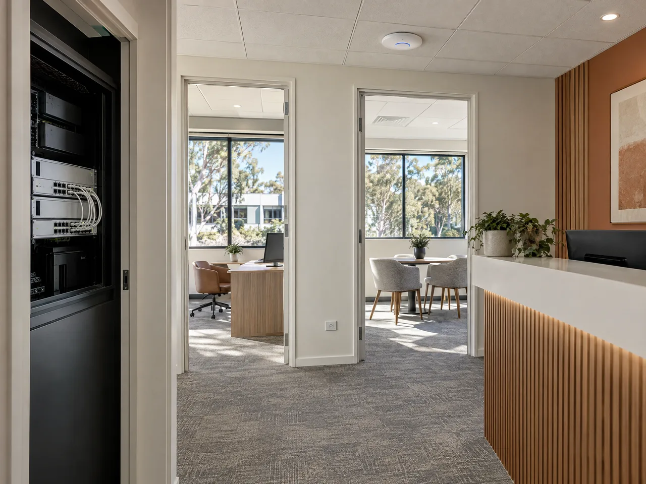 Illustrative Joondalup multi-room professional tenancy with ceiling-mounted UniFi Wi-Fi.