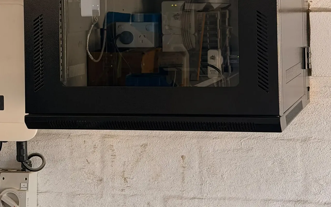 Illustrative network cabinet with organised equipment